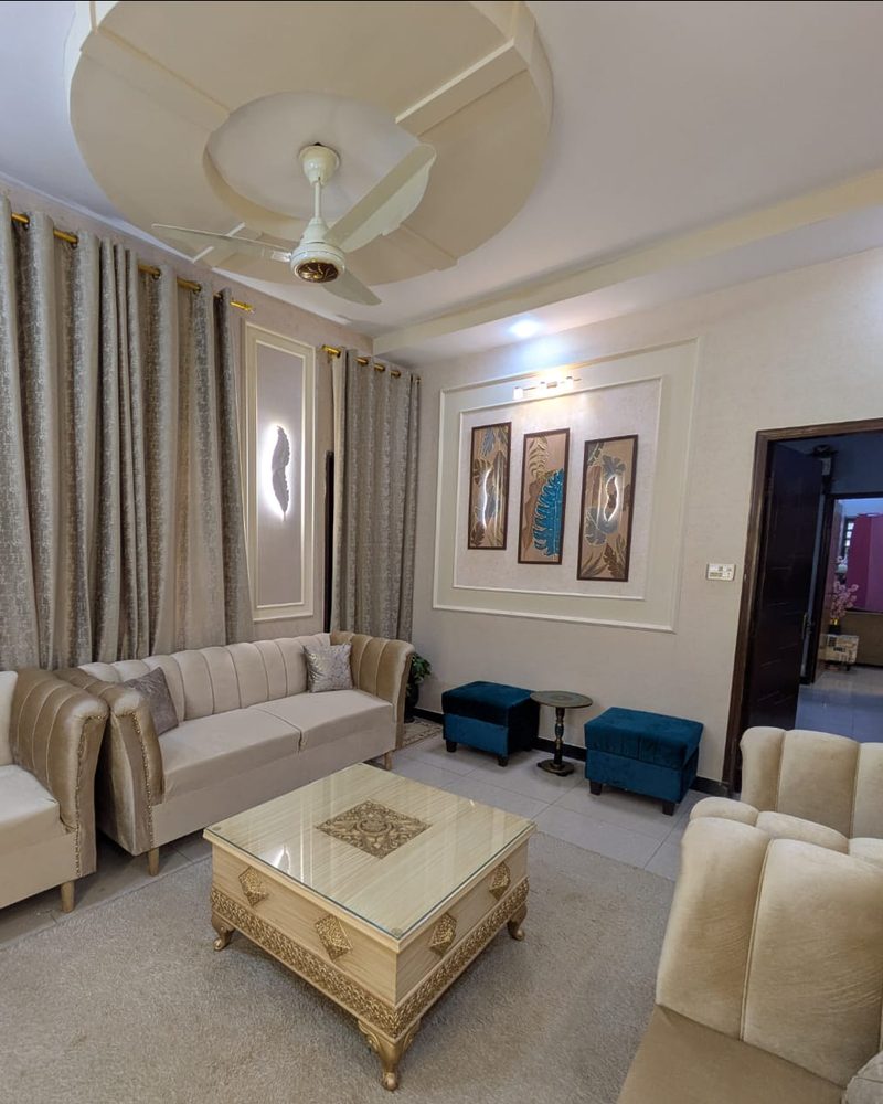 Living room after: Living room: false ceiling, finishing & furnishing